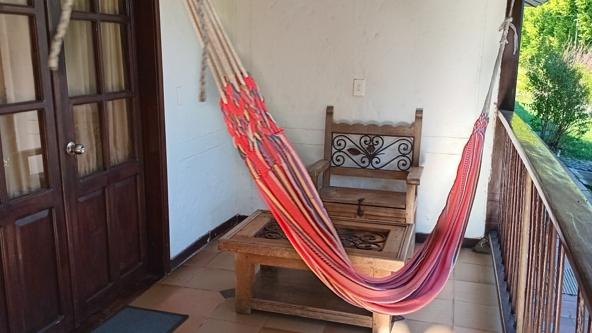Suite Ejecutiva - hamaca en terraza colonial